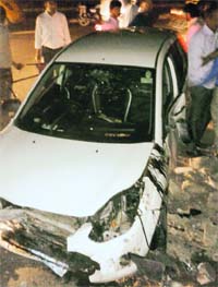 The car that was damaged after it met with an accident at the Ram Darbar roundabout on Wednesday night. The occupants of the car were injured.