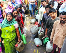 Residents line up at an outlet for kerosene in Sector 29, Chandigarh.