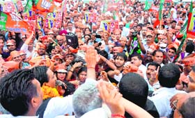Mammoth support: Former Chief Minister Ramesh Pokhriyal Nishank addresses a gathering post-filing his nominations at Pantdeep mela ground in Haridwar on Thursday