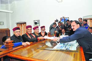 Virender Kashyap, candidate for Shimla seat (BJP), files his nomination at the DCs office in Shimla on Thursday. 