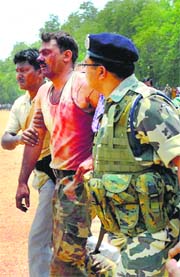 An injured CRPF jawan being taken for treatment after an explosion triggered by Maoists at Bermo in Bokaro district of Jharkhand on Thursday