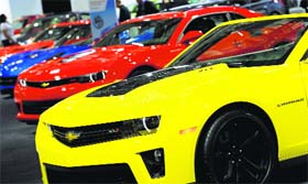 Chevrolet Camaros are displayed during the second press preview day at the 2014 New York International Auto Show on Thursday.