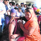 Khushpreets mother Kulwinder Kaur breaks down after a scuffle with relatives of the convicts in the court on Friday.