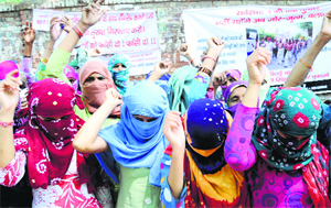 Four Dalit rape victims of Bhagana village in Hisar district and their relatives protest at Jantar Mantar in Delhi on Friday. 