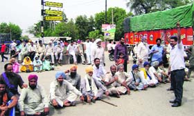 Farmers protest in Sangrur on Friday.