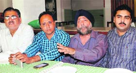 MP Singh Chatha, president, Indian Cement Importers Association, (second from right) addresses mediaperson in Amritsar on Saturday