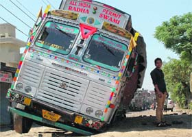 A truck stuck on the road in front of the historical Chehharta Sahib Gurdwara in Amritsar on Saturday