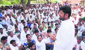Dushyant Chautala addresses workers in Hisar.