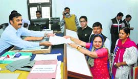 Anita Rana files her nomination papers for the Assembly byelection at Sujanpur on Saturday.