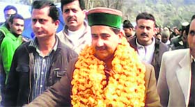 Forest Corporation vice-chairman Kewal Singh Pathania campaigning at Shahpur on Saturday.
