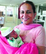 54-year-old Paramjeet Kaur with her daughter Angel at the DMCH. a tribune photograph