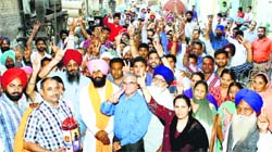 Independent candidate Simarjit Singh Bains with supporters in Ludhiana. A Tribune photograph