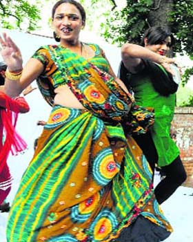 Sweet success: Members of the transgender community dance to celebrate the SC verdict recognising them as the third sex, in New Delhi on Saturday