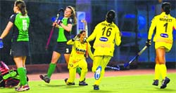 The Indian women celebrate after scoring a goal against Ireland in their last match of the three-match Test series in Dublin; and Rupinder Pal Singh (right) scored the only goal in the Indian mens 2-1 loss to Netherlands in The Hague on Saturday. Tribune photos 