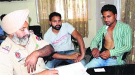 Gagandeep, driver of the bus, gives a statement to the police in Amritsar on Sunday.