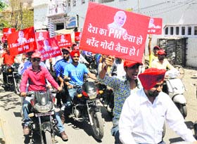 Members of Team Modi, Punjab take out a bike rally in support of BJP's Prime Ministerial candidate Narendra Modi in Amritsar on Sunday.