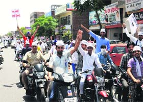 AAP workers join the road show in Bathinda on Sunday