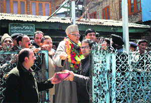 National Conference president Farooq Abdullah arrives at an election rally in the Palpora locality of Srinagar on Sunday. 