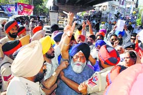 Riot victims protest outside the Congress office in Amritsar on Sunday