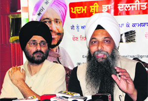 Jarnail Singh, AAP candidate from Delhi (West), addresses mediapersons in Amritsar on Monday.