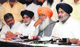 Sukhbir Badal (right) addresses mediapersons while releasing the election manifesto of the SAD in Bathinda on Monday