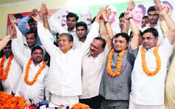 BSP leaders from Haridwar who joined the Congress with Chief Minister Harish Rawat at Congress Bhavan in Dehradun on Monday. A Tribune photograph