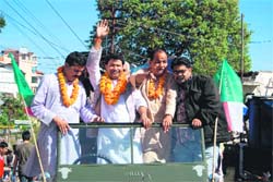 Members of the Uttarakhand Kranti Dal (Aeri) during a roadshow in Mussoorie on Monday. A Tribune photograph