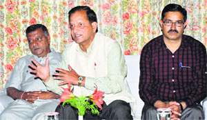 Former BJP minister Kishan Kapoor addresses a press conference in Dharamsala on Monday