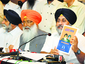 SAD chief Sukhbir Badal (R) and party leader Sukhdev Singh Dhindsa during the release of partys manifesto in Bathinda.