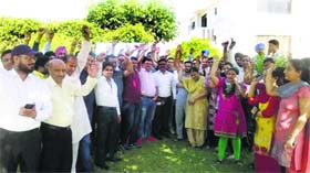 Parents of the students studying at Bal Bharti Public School protest outside the school in Ludhiana.