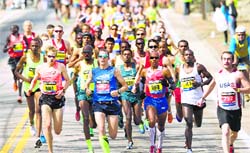 Elite runners race during the Boston Marathon on Monday. Nearly 36,000 athletes took part in the 118th edition, the first since last year's bombing. Reuters