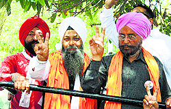 AAP candidate Dr Daljit Singh (extreme right) seeks support from people in Amritsar on Tuesday