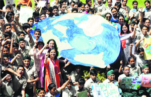 Students of Ashiana Public School, Sector 46, Chandigarh, celebrate Earth Day on Tuesday. 