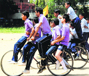 Students take part in an event during the World Earth Day celebrations at GMSSS, Sector 10, in Chandigarh on Tuesday.
