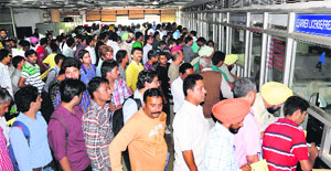It was yet another day of harassment for applicants as they stood in queues to get tokens at the office of the Registering and Licensing Authority in Sector 17, Chandigarh, on Tuesday.
