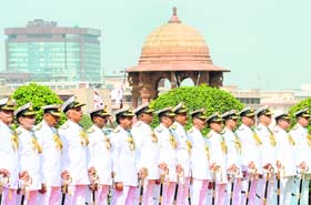 Senior Navy officers line up outside South Block in New Delhi for a ceremonial function