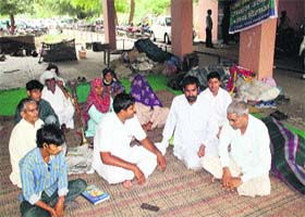 In protest: Dalit residents of Bhagana village sitting on dharna inside the mini-secretariat complex in Hisar on Tuesday