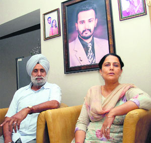 Mother and father of Gurkirat Singh Sekhon during their meeting with Jalandhar Tribune team on Monday