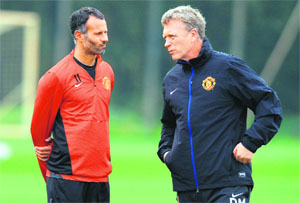 Veteran midfielder Ryan Giggs has been appointed to take interim charge of the team for the final four games of the season after David Moyes was sacked on Tuesday