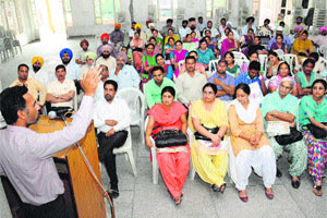 Harjit Zeeda, a teacher union leader, speaks during a convention at Teachers Home in Bathinda on Wednesday.