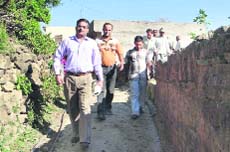 Chief Judicial Magistrate Hemraj Mittal with paralegal volunteers during an inspection at Morni on Wednesday