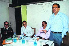 Officials from the Tourism and Transport Department address taxi drivers during a workshop in Mussoorie on Wednesday. a tribune photograph