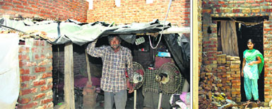 Jai Narayan; and (right) a girl show dilapidated condition of their houses at Kot Ramdas in Jalandhar on Wednesday.