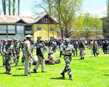 Security personnel and polling staff in Anantnag on the eve of polling on Wednesday.