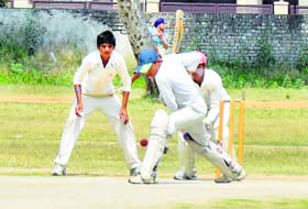 A batsman plays a shot during the Punjab State Inter-District Cricket Tournament (U-16) for ML Markan Trophy in Ludhiana