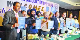 Office-bearers of the Hotel and Restaurant Association launch the Punjab Tourism Guide in Ludhiana