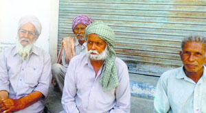 A few ex-servicemen discuss poll issues in Khwaspura village on Wednesday