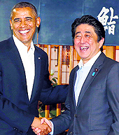 US President Barack Obama with Japans PM Shinzo Abe in Tokyo on Wednesday