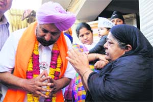 AAP candidate Dr Daljit Singh during an election campaign in Amritsar on Thursday