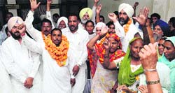 Naveen Valmiki along with SAD workers after joining the Congress in Bathinda on Thursday. Tribune Photo: Pawan Sharma